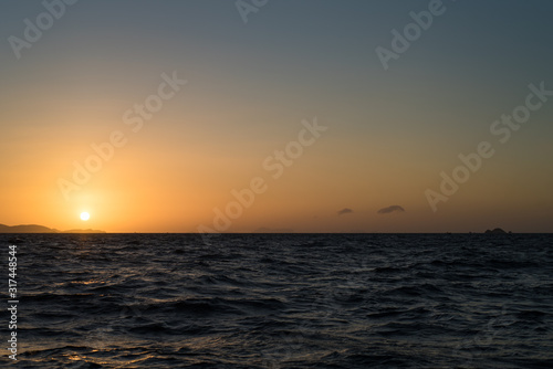Beautiful sunrise by the sea © ancamilushev