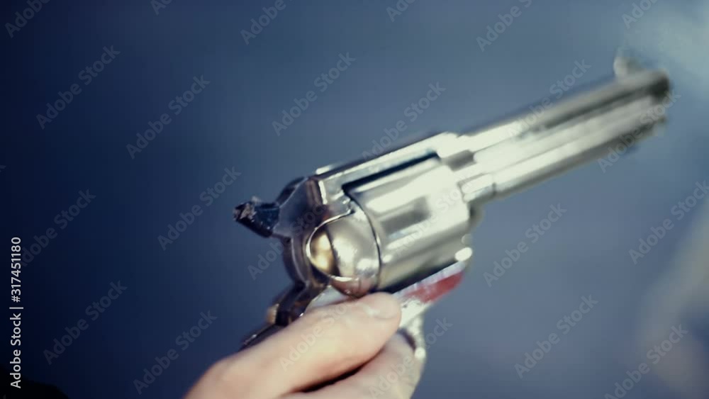 spinning a revolver up close cylinder