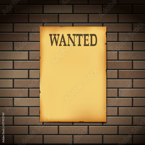 Wanted reward western poster on a brick wall.