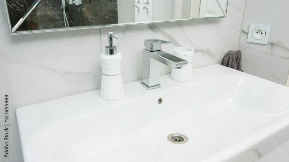 Stylish glamour luxurious bright bathroom, calacatta marble texture Stylish glamour luxurious bright bathroom, calacatta marble texture