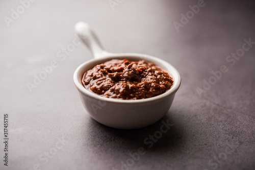 Homemade Tandoori Paste or Marinade mixture, in a bowl. used for grilled chicken or Paneer or vegetable. selective focus
