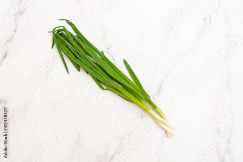 Top view of a bunch of green onions. Traditional natural medicine against colds and other diseases