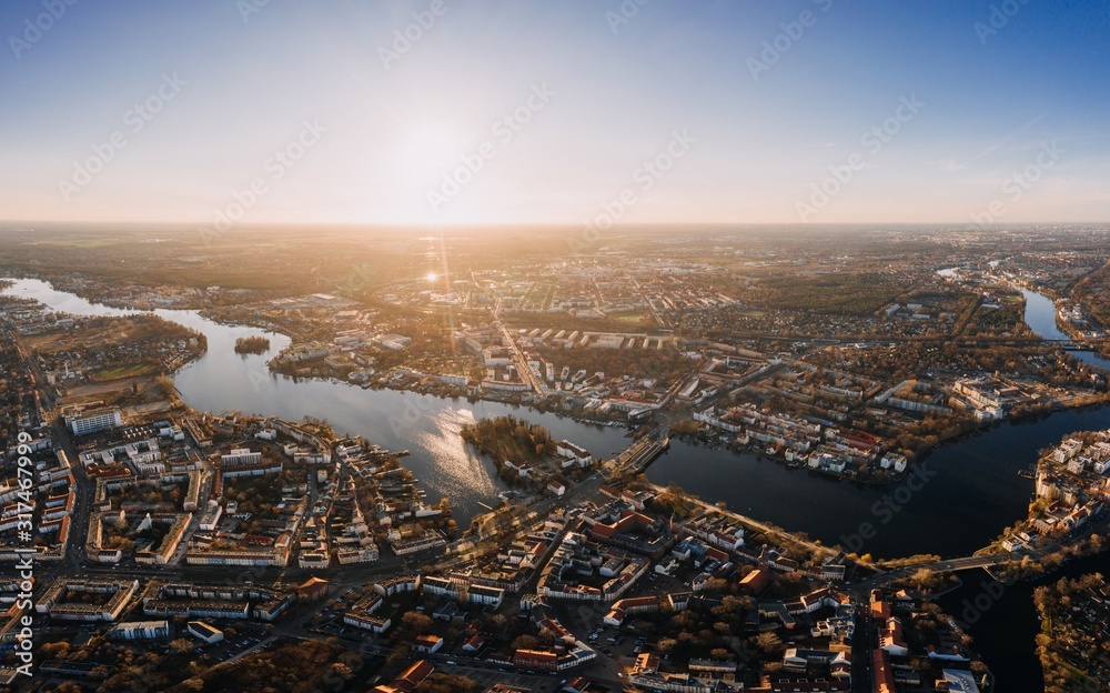 Obraz na płótnie panorama drone photo of the old city Treptow-Kopenick Berlin at sunrise w salonie