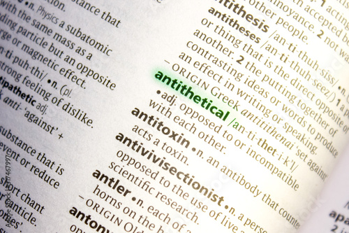 Antithetical word or phrase in a dictionary. photo