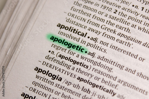 Apologetic word or phrase in a dictionary. photo