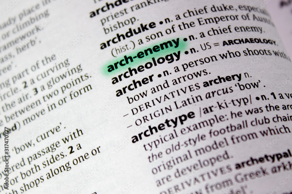 Naklejka premium Arch-enemy word or phrase in a dictionary.