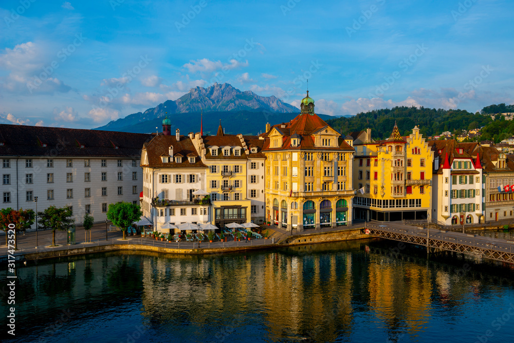 City of Lucerne with River and Building and Mountain Pilatus in a Sunny Day in Switzerland.
