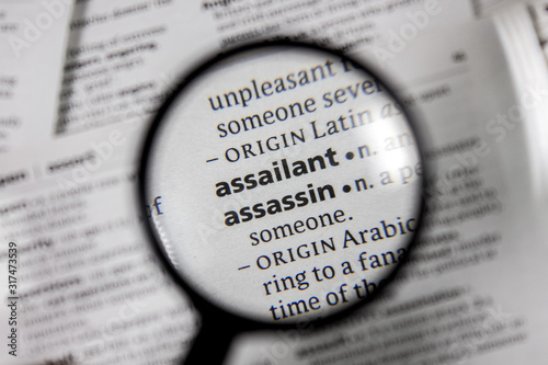 Photos The word or phrase assailant in a dictionary.
