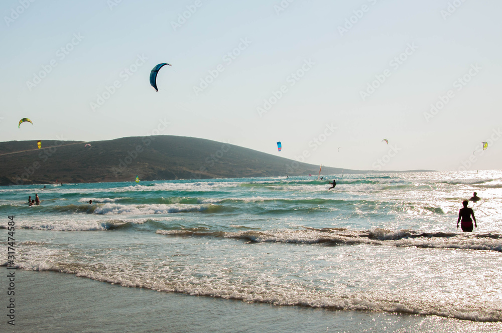 Rhodes, Greece - August 08, 2018: Windsurfing, sailing on the island of Rhodes, Greece Rhodes, Greece - August 08, 2018: Windsurfing, sailing on the island of Rhodes, Greece