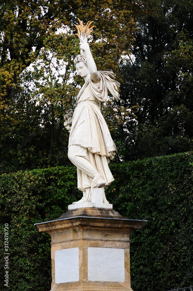 Florence, Italy. Old Boboli Gardens during a sunny day in spring season. Ancient Sculptures.