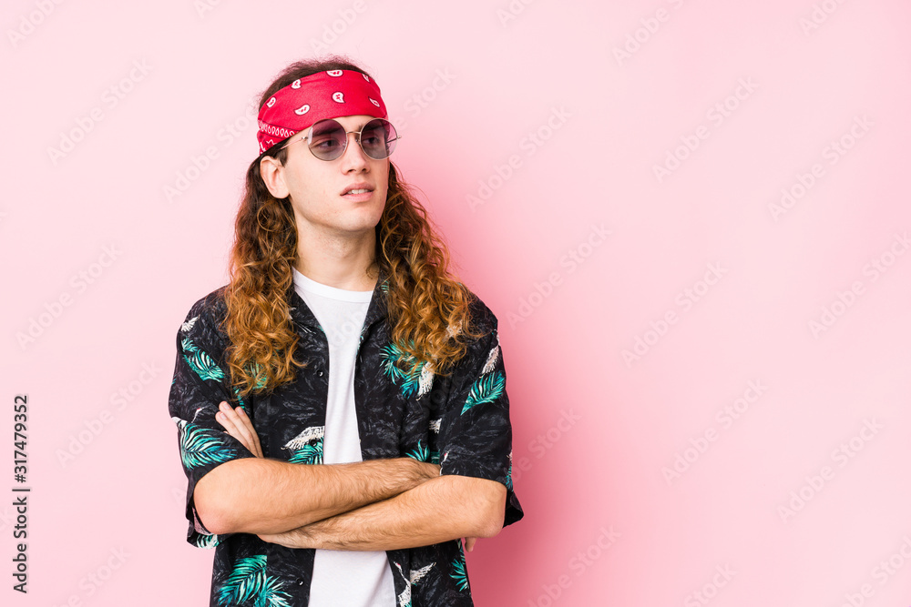 Young hippie caucasian man isolated smiling confident with crossed arms.