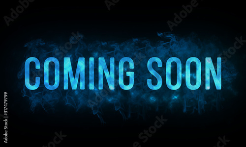 Word coming soon is written with blue color on dark background with smoke effect, illustration photo