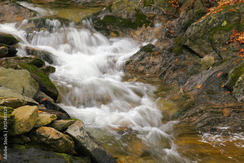 Waterfall on mountain stream in the National park Sumava-Czech Republic. Autumn landscape. Waterfall on mountain stream in the National park Sumava-Czech Republic. Autumn landscape.