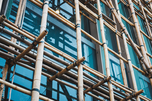 Obraz na płótnie Bamboo scaffolding on building construction site