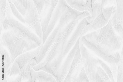 white cloth texture background, wavy fabric. top view.