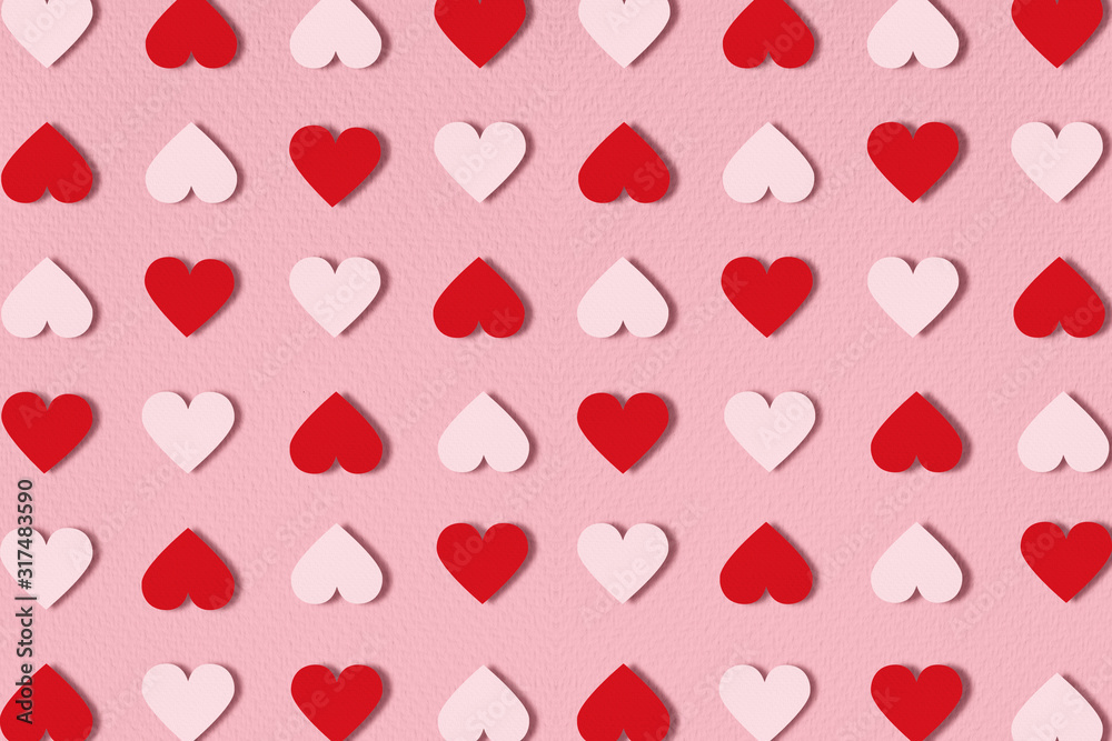 Seamless pattern with hearts on paper pink background. Flat lay. Top view Valentine's day concept.