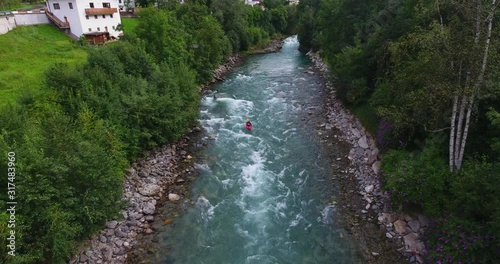 Aerial Drone Shot Kayaking Down Whitewater Rapids in Rosanna River The Alps photo