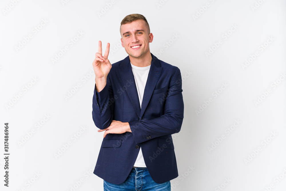 Young business caucasian man showing number two with fingers. Young business caucasian man showing number two with fingers.