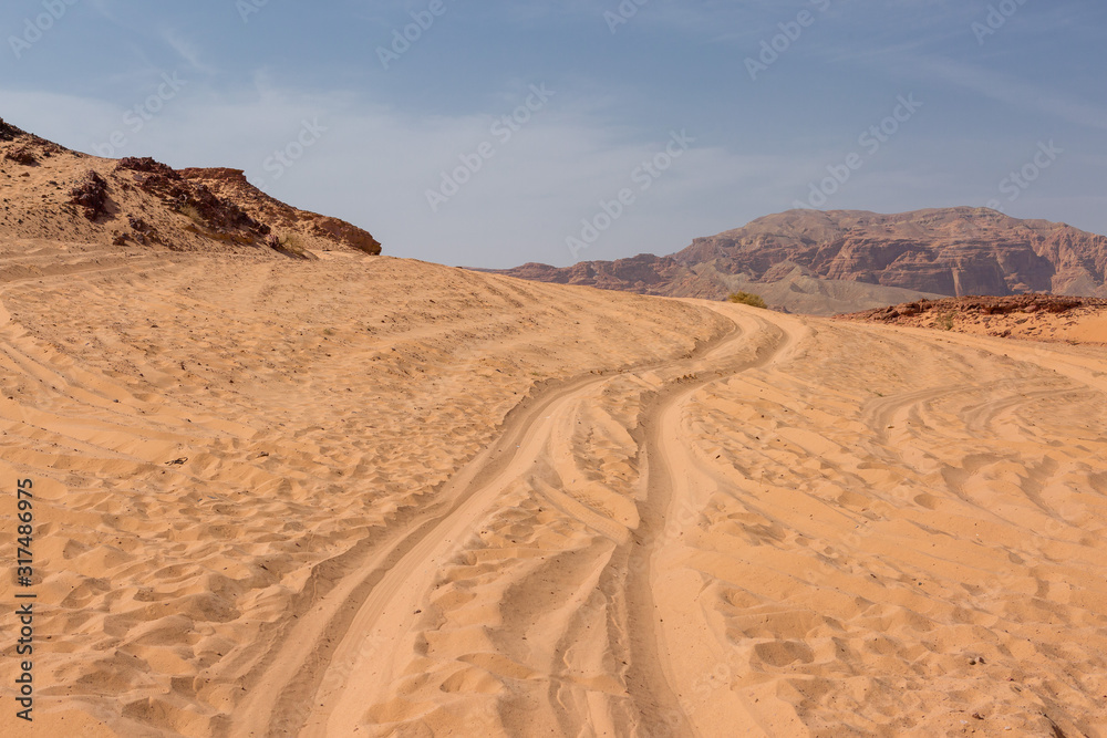 Coloured Canyon is a rock formation on South Sinai (Egypt) peninsula. Desert rocks of multicolored sandstone background.