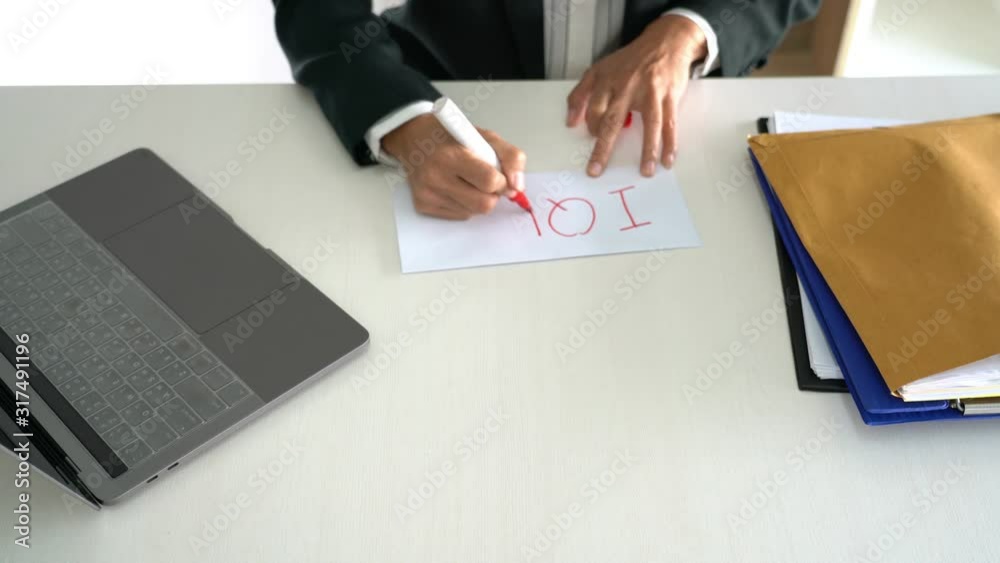 4k video of Business man signing his resignation in office write I Quit ...