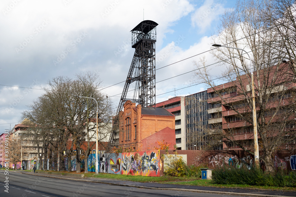Jindrich mine, Ostrava, Czech Republic / Czechia - former headframe of the mine. Street in industrial city. Jindrich mine, Ostrava, Czech Republic / Czechia - former headframe of the mine. Street in industrial city.