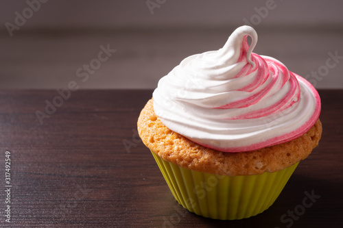 Vanilla cupcake, with a protein cream in the form, stained with red currant juice.