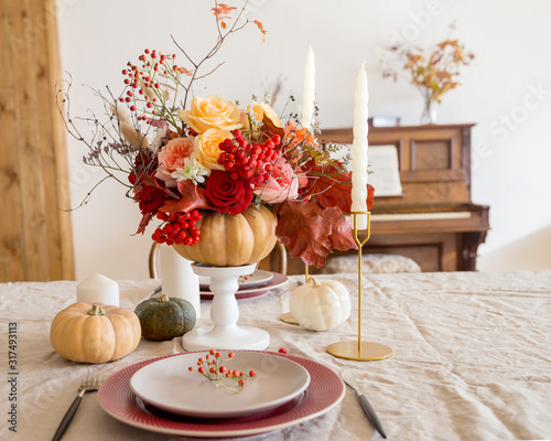 Table setting with empty plates and tableware