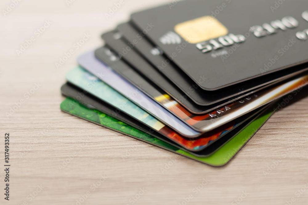 Many credit cards in different colors. Different credit cards. Contactless payment. Many credit cards in different colors. Different credit cards. Contactless payment.
