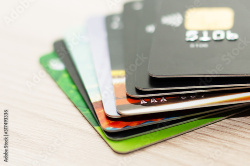 Many credit cards in different colors. Different credit cards. Contactless payment.