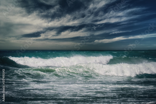Stormy ocean landscape with rainy clouds © PerfectLazybones