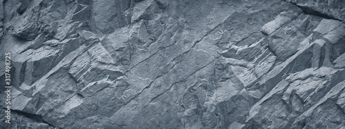 Gray grunge banner. Abstract stone background. The texture of the stone wall....