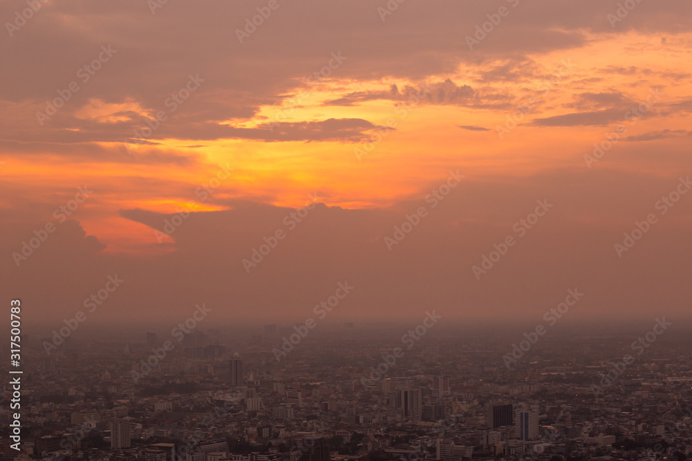 Colorful of sky and cloud in sunset,and twilight,with cityscape in the evening