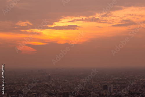 Colorful of sky and cloud in sunset,and twilight,with cityscape in the evening
