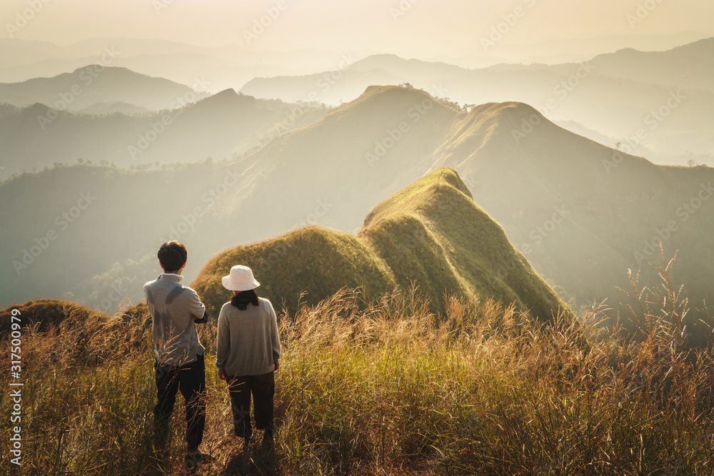 couple looking the scenics of mountain