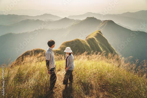 Couple looking the scenics of mountain