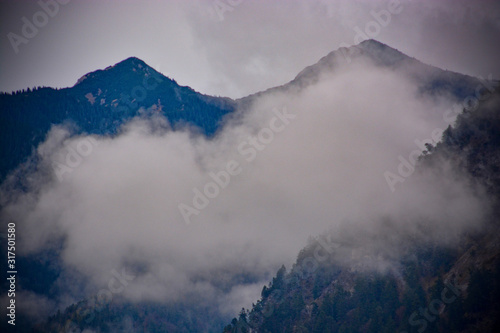 Alps Alpine Landscape near Reutte in Austria with mist