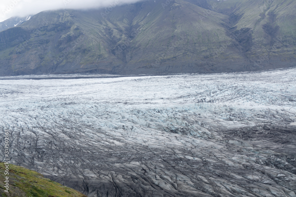 View to a glacier tongue formed by melting of Vatnajökull, the biggest glacier in Europe. Located in southeast Iceland.