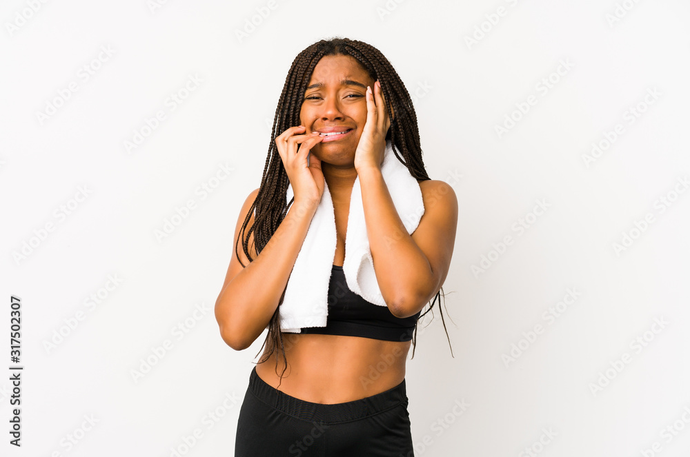 Young african american sport woman isolated whining and crying disconsolately. Young african american sport woman isolated whining and crying disconsolately.