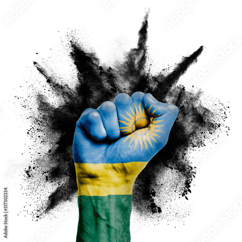 Rwanda raised fist with powder explosion, power, protest concept photo