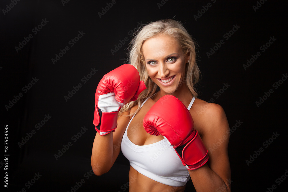 Boxing gloves up, female fitness boxing in red, white and black Boxing gloves up, female fitness boxing in red, white and black