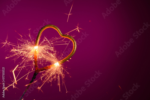 Sparkler in shape of heart. Wedding love Valentine's day banner template with place for text.