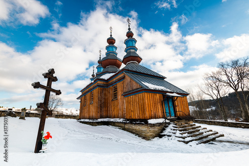 Exterior of Komancza Wooden Orthodox Church.  Bieszczady Architecture in Winter. Carpathia Region in Poland