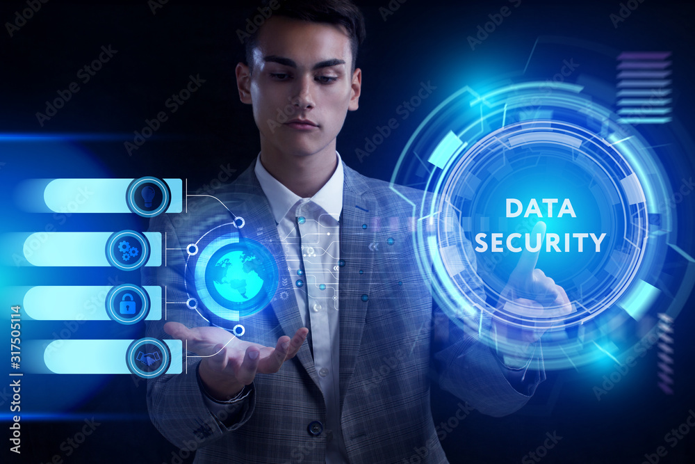 Business, Technology, Internet and network concept. Young businessman working on a virtual screen of the future and sees the inscription: Business, Technology, Internet and network concept. Young businessman working on a virtual screen of the future and sees the inscription: