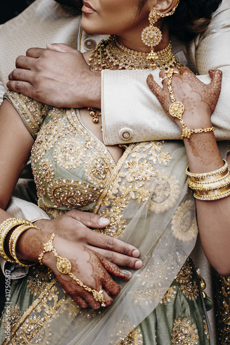 Indian wedding accessories, wedding outfits on the bride and groom © IVASHstudio