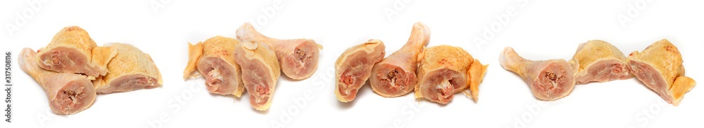 Pieces of chicken raw meat on a white background