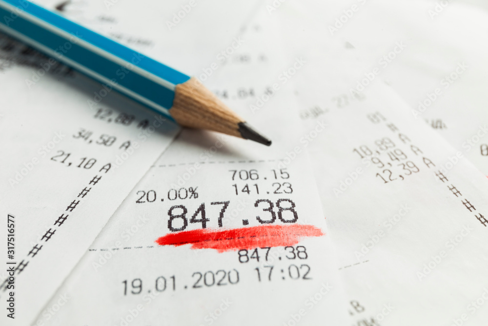 Paper register receipts in stack. Price and cost in store (shop). Paper register receipts in stack. Price and cost in store (shop).