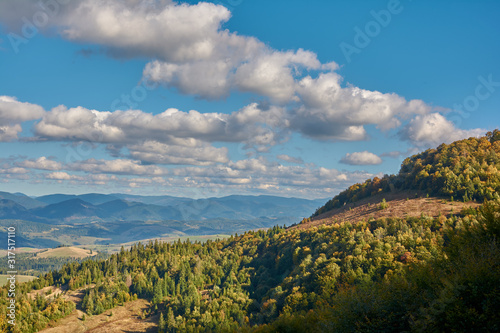 Mountain landscape in Carpathian Mountains, Pylypets, Ukraine. View of the valley and village of Pylypets from Gymba Mountain.