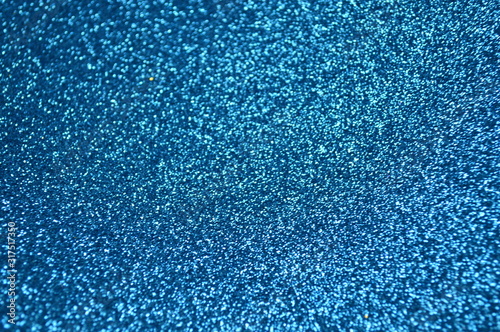 Abstract of the surface of the glittering sheet that is exposed to sunlight