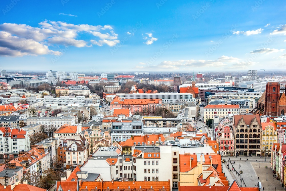 The city of Wroclaw, a beautiful view of the bright roofs of the houses.