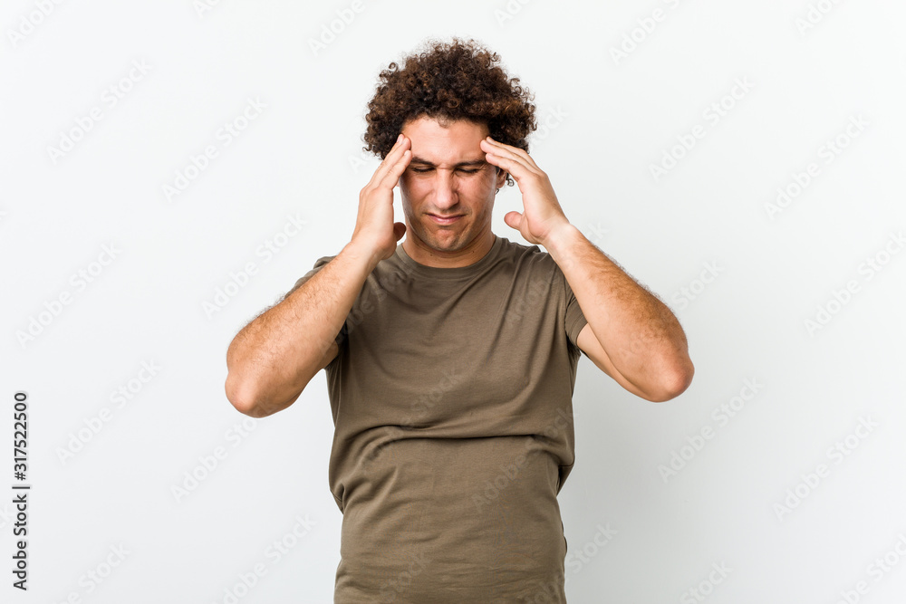 Mature handsome man isolated touching temples and having headache. Mature handsome man isolated touching temples and having headache.